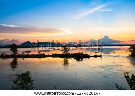 Boats and floating houses on Mekong river in the Mekong delta, An Giang, Vietnam