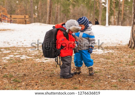 Little boys on a photo shoot in the winter park