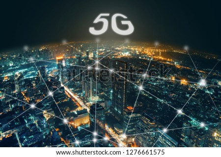 Network and Connection technology night city background at business center bangkok thailand. Wireless skyline connection with energy light infographic. 5G connection concept