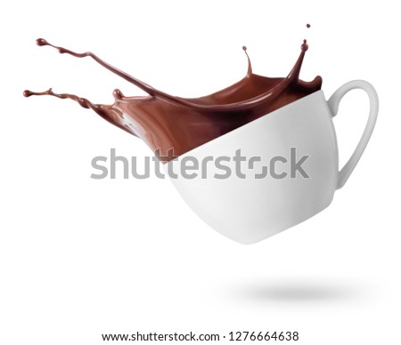 cup of spilling chocolate or cocoa with splash isolated on white background
