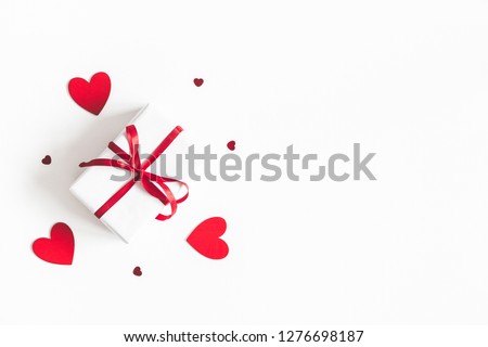 Valentine's Day background. Gift box on white background. Valentines day concept. Flat lay, top view, copy space
