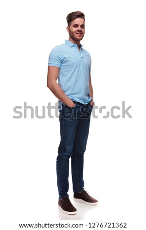 relaxed casual man in polo shirt standing on white background and holding pockets, full body picture