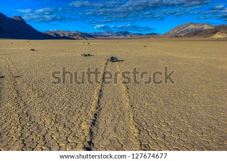 The Racetrack and mysterious moving rocks, Death Valley National Park, California Royalty-Free Stock Photo #127674677