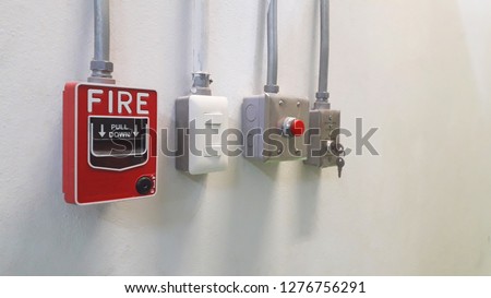 conventional initiating devices ,fire alarm pull stations and emergency switch on the wall