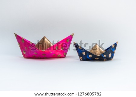 Paper boat origami folding art colored