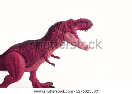 Baby toy isolated on background, children's toy, dinosaur