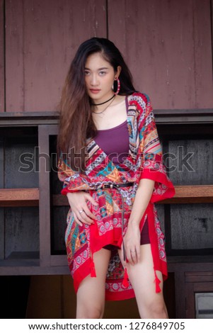 Portrait of thai china adult bohemian girl relax and smile