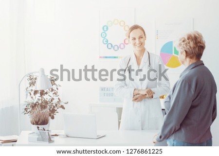 Female doctor smiling at her patient in the office
