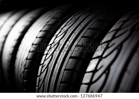 Tire stack background.  Selective focus. Royalty-Free Stock Photo #127686947