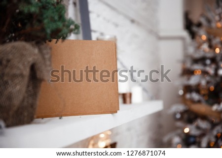 Kraft envelope lies on the white shelf