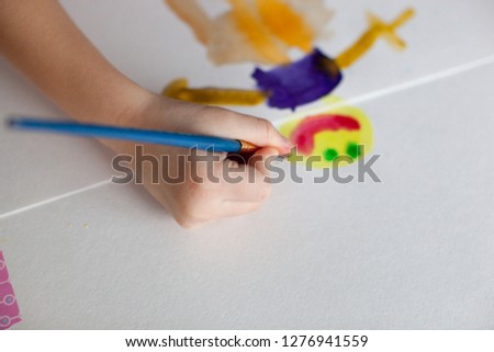 Girl drawing her father.