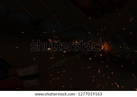 Welding steel pipe with sparks