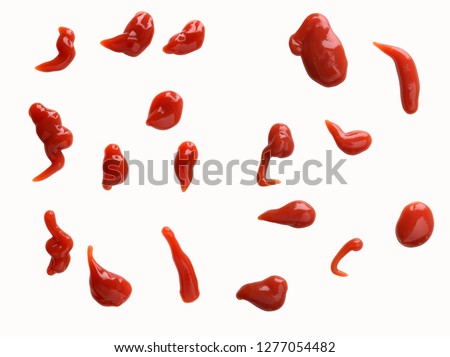 Set of ketchup splashes isolated white. Horizontal composition. Royalty-Free Stock Photo #1277054482