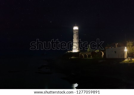 'Sources of light' (Lighthouse at Cape Tarkhankut, Crimea under the stars)