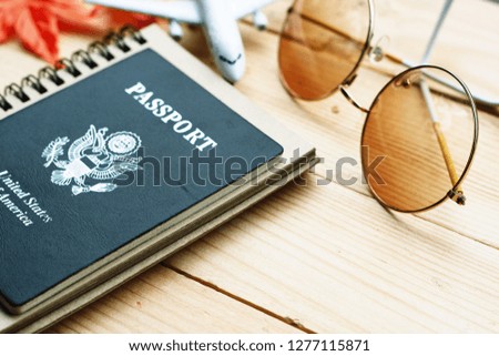 Passport and travel concept  placed on a wooden table