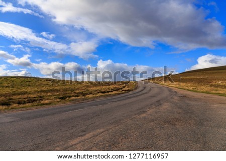 Lonely highway through the Cairngorms national park in Scotland, UK.