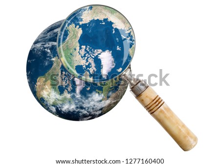 North Pole - Earth with magnifying glass
