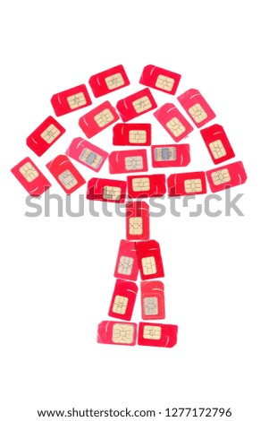 Red cellular sim card arranged into a tree mean global warming isolated on white background