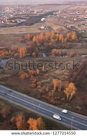 Aerial view of trees in a colorful autumn season forest