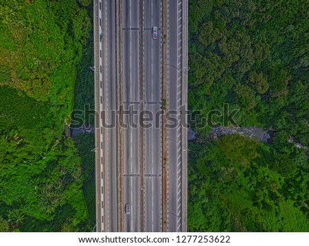 Aerial top view of Colville motorway bridge (Pont Colville) which was built above a valley located near Bagatelle, Mauritius