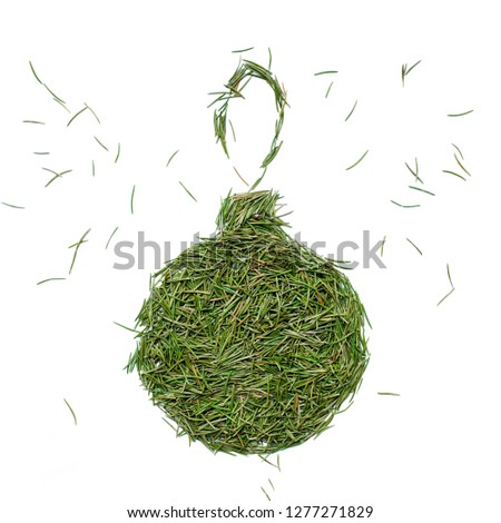 Christmas fir tree toy decoration ball made manually of spruce needles. Filling shape isolated on white. Christmas minimal style