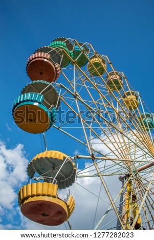 Vintage ferris wheel in an amusement park.