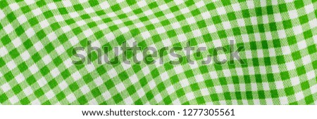 Checkered draped green fabric, Easter banner background