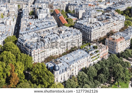 Aerial view of city rooftops from the Eiffel Tower in Paris, France