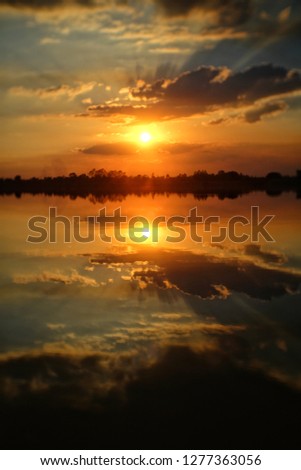 Sunset with reflection on the water
