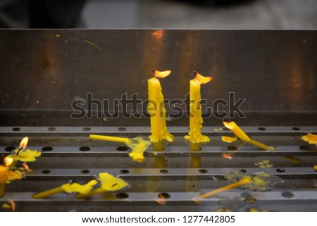 Temple of Buddha worship in the temple of Thailand;candle.