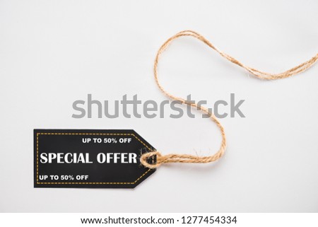 Special Offer 50% off black tag or price tag with brown string on white background, vector illustration