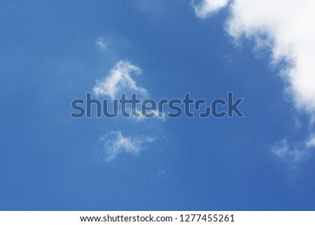 Blurry blue sky and clouds for Inspirational quotes background and wallpaper