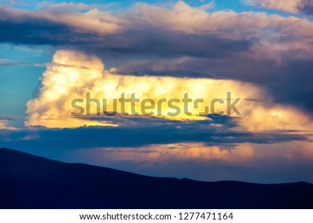 Beautiful dramatic cloudscape view in Carpathian mountains, Ukraine.