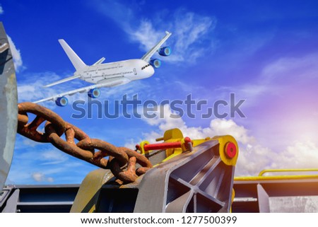 old big chain of Mooring winch, Mooring winch lass rope anchor at ship forward in shipyard of large with Big Chain and rusty on blue sky background.
