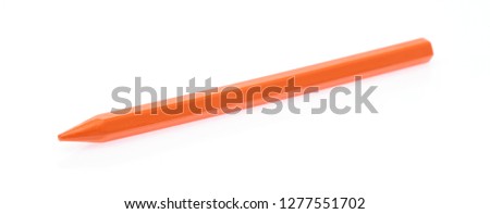 Orange Crayon Wax Pencil Isolated on White Background