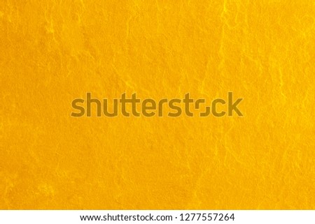gold color wall for background.