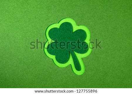 St. Patrick clover cut from paper. Greeting card. Paper craft.