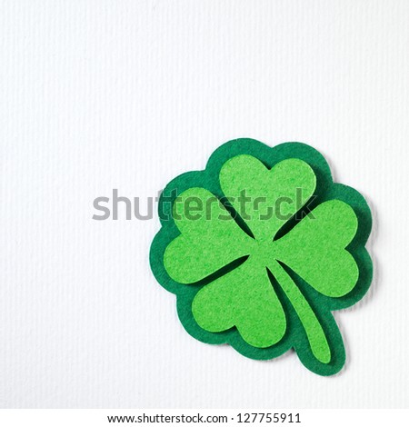 St. Patrick clover cut from paper. Greeting card. Paper craft.