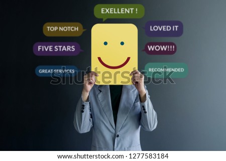 Customer Experience Concept. Happy Client standing at the Wall with Smiling Face on Paper. Surrounded by Positive Review in Speech Bubble