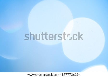 Abstract blur blue bokeh water texture background