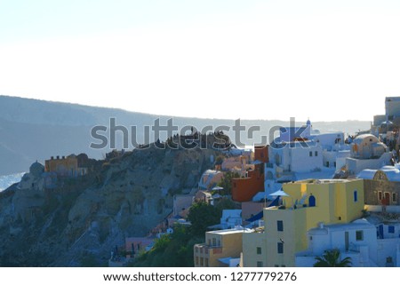  Tourists waiting to take pictures of the sunset in Santorini, Cyclades