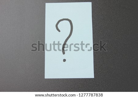 question mark drawn on paper