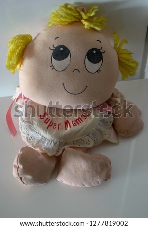 rag doll super mom (Super Maman is super mom written in French) for mother's day, cut out object