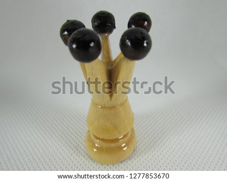 Chess queen on white background