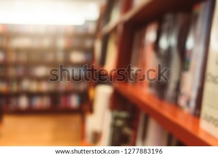 Blurred background of pile of book, bookshelf store wisdom smart learning concept of information innovation education  knowledge in technology, language, science, biology, law, history, comic, physics