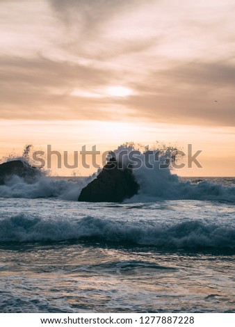 Beautiful colorful sunset in the atlantic ocean sea of ​​big waves and sky