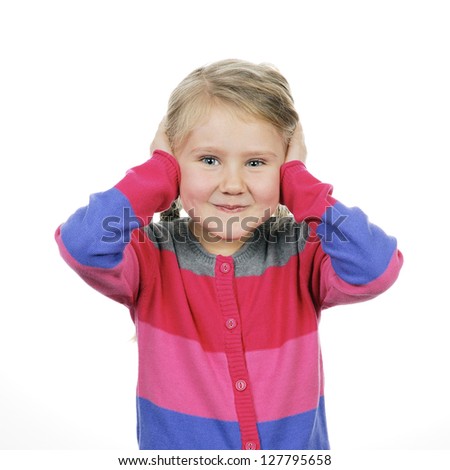 Young girl covering her ears with her hands