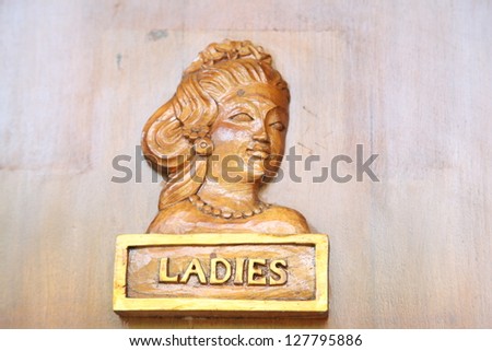 Woman wooden vintage sign