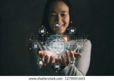 Beautiful girl good mood Holding global network connection and icon customer on screen. Social media, Networking and business technology