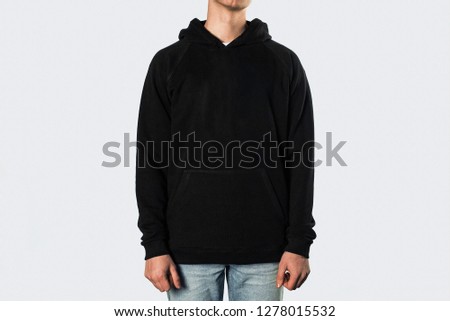 Man in a black sweater. For logo overlay. Base Hoodie 